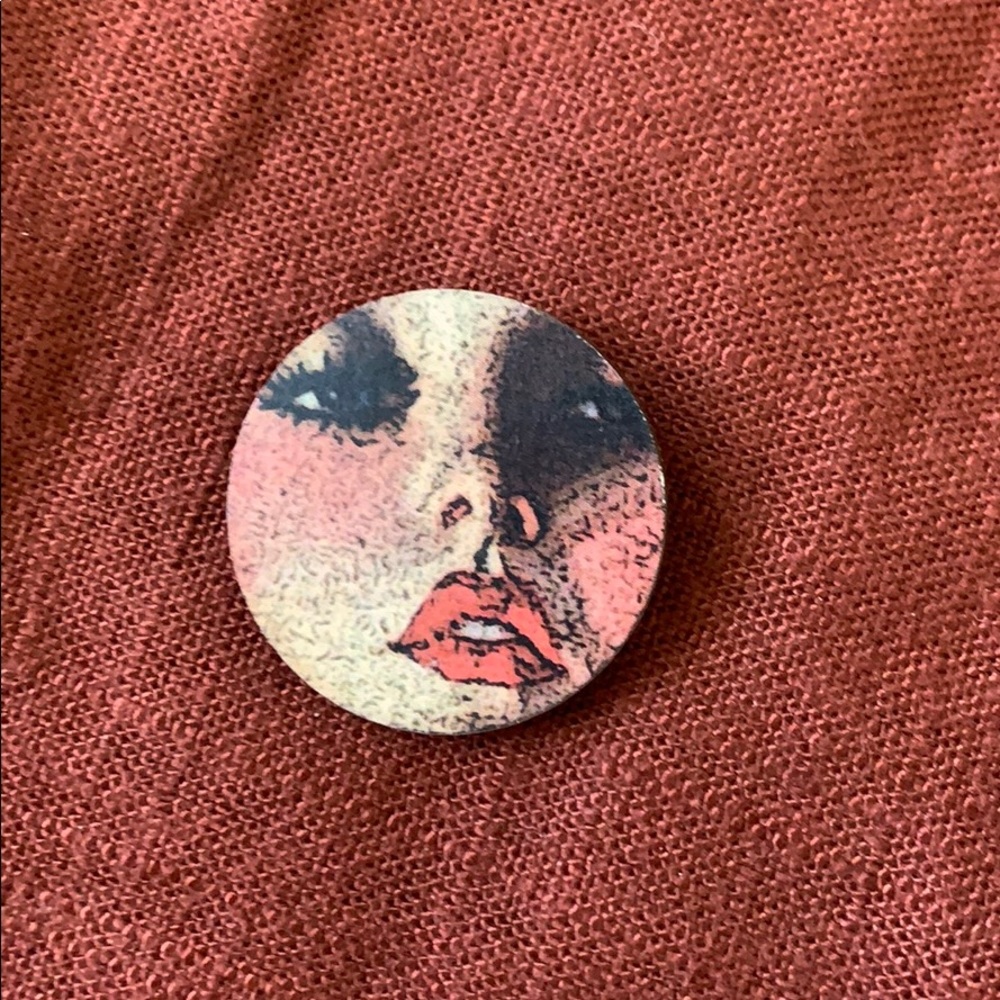 Unique woman’s face brooch